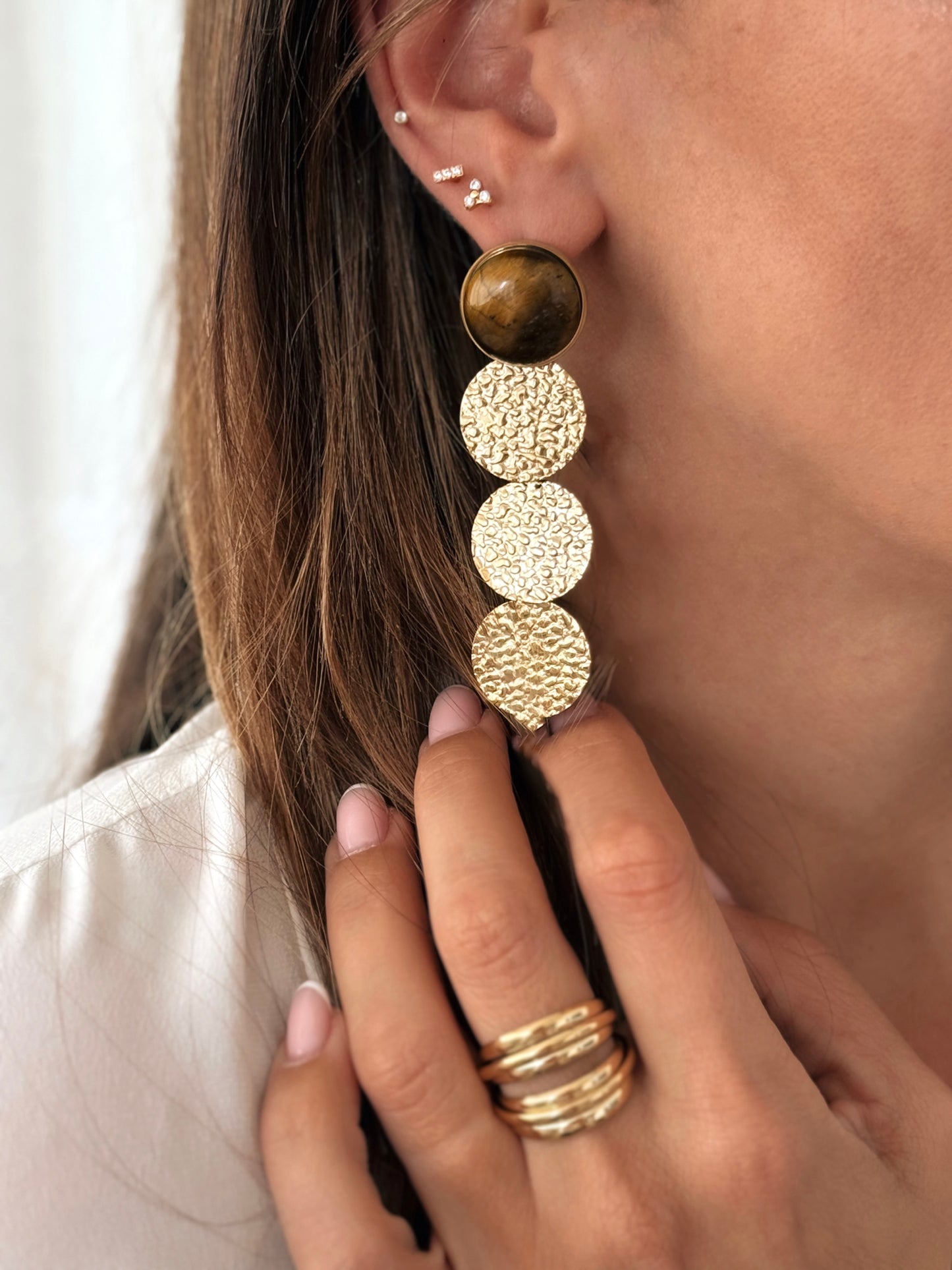 Les Boucles d'Oreilles Dorie